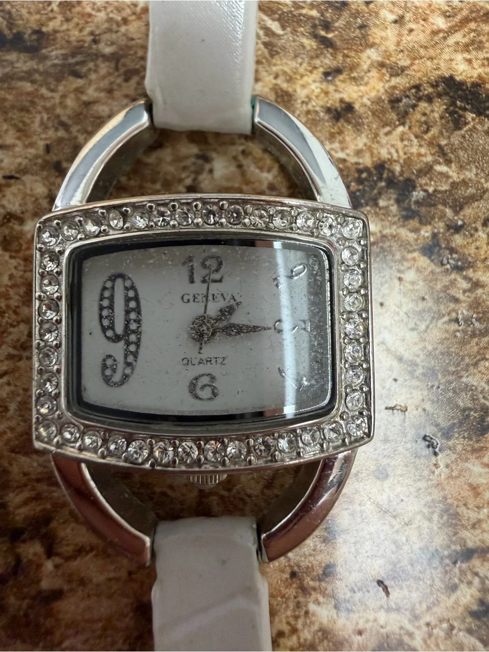 Geneva Womens Rhinestone Watch White Band Silver Tone Bling needs battery